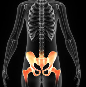 Image of chiropractor treating sacroiliac joint dysfunction